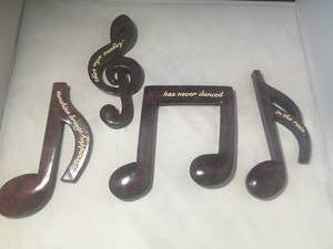 lot 67 image: WALL DECOR MUSIC NOTES, ANYONE WHO SAYS SUNSHINE WILL BRINGS HAPPINESS HAS NEVER DANCED IN THE RAIN