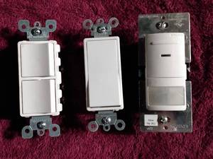 lot 125 image: Leviton electrical switches and motion sensor