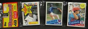 lot 163 image: 1985 Topps 48 Card Rack Pack. ROGER CLEMENS, MARK MCGWIRE KIRBY PUCKETT rookie