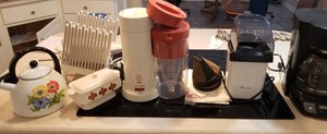 lot 54 image: Mr. Coffee Maker Model CGX23, Toastmaster Popcorn Popper Model TPC2, Mr. Coffee Tea Brewer Model TM1, Japan Food Warmer, Tea Kettle, Presto Bread Slicer, Meat Carver