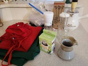 lot 65 image: Ceramic Hot Chocolate Frother with tiny Whisk, Cooking Aprons, Fred Tea Infuser and HamBrights Nutcracker