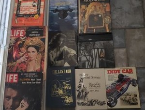 lot 117 image: Historical Books Katharine Hepburn, History of the Motorcar, The Last Run, Indy Car  and Liz Taylor Life Magazines