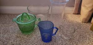 lot 128 image: Vintage Glass 2 Cup Juicing Measure and Mixing Cup, Shirley Temple Mug, and other Measuring cups