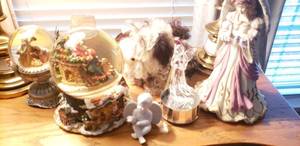 lot 129 image: Snow Globes and Music Boxes Angel Music Ceramic, Doggie in the Window Music Doll, and Metal Airplane Music Box