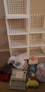 lot 144 image: Two Nautica Window Valances still in Packaging, Two Sonoma 12-piece set Rainbow Falls placemats and napkins, and assorted linens, see pictures with Yaffa Blocks