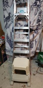 lot 205 image: UL Metal Ladder Aluminum 6 Foot, 2 Plastic Step Stools