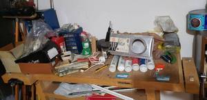 lot 220 image: Contents of Work Table Hardware, Dryer Close Connect, Gas Can, and More