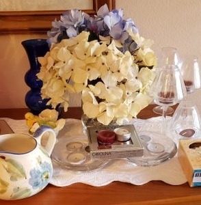 lot 9 image: Flower Arrangement, Tea Light Candle Holders, Hand Painted Jar from Portugal, and Chick Figurines