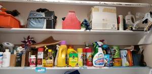 lot 22 image: Various Cleaning Supplies, Lightbulbs, Cleaning Carrier as Shown Plus Rolling Cart between Washer and Dryer