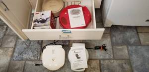 lot 25 image: Belgian Waffle Maker Model 233, George Foreman Grill Model GR-10A, Salton Quesadilla Maker Model QM2SFR K, Dash Egg Cooker NIB
