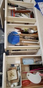 lot 34 image: Measuring Spoons, Salad Tongs, Wooden Spoons and Spatulas, Knife Sharpening Tools and Ware Ever Aluminum Strainer