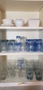 lot 39 image: Water and Juice Glass Sets (Clear and Blue), French Wine Glasses, Gravy Boats and Loaf Dish