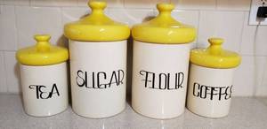 lot 47 image: Mid-Century Sugar, Flour, Tea and Coffee Ceramic Canister Set, Yellow, Large ones approx. 14 Tall