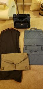 lot 82 image: Protocol Rolling Luggage Bag, Garmet Bag, Travel Organizers