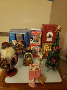 lot 194 image: Christmas Snow Globes, Dillards Ornament, Santa Figurine, 20 Metal Christmas Tree Tea Light Holder