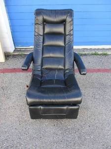lot 38 image: Gamer Style Floor, Leather Rocker  Recliner, By Best Chairs Inc.