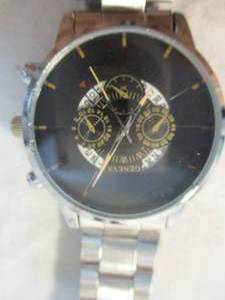 lot 13 image: NEW- Geneva-Mens Fashion Business, DayCalendar Stainless Steel Quartz Analog Wristwatch