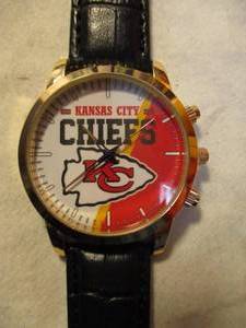 lot 9 image: NEW- Kansas City Chiefs Football- Quartz Analog Wristwatch, With  Black Leather Band. New In Package