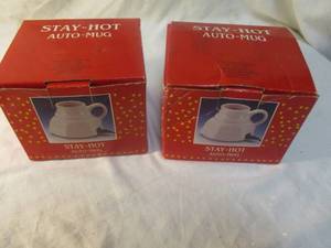 lot 65 image: 2-Vintage 1990 Ron Gordon Designs White Ceramic Stay-Hot Auto-Mugs with 12V DC plug, Unused-In Boxes.
