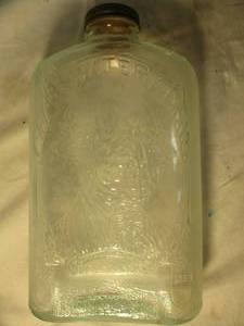 lot 74 image: Vintage- 1932 -Washington Bicentennial Commemorative Embossed Water Bottle 1731-1932 By Hemingray Glass Co.