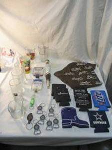 lot 91 image: Collectors Lot- Beer Bottle Opener-Key Chains, Beer Tap Markers, Beer can koozies, Crown Royal Vanilla Bandana And Glasses