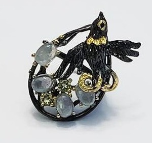 lot 4 image: Sterling Silver Ring with Pale Labradorite and Peridot.  Stamped 925 - Size 7
