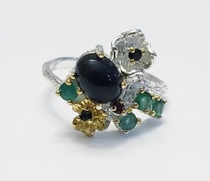 lot 6 image: Sterling Silver Ring with Black Opal and Garnet.  Stamped 925 - Size 8.5