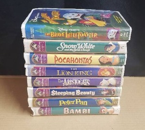 lot 47 image: Lot of 8 Walt Disney VHS Tapes - Bambi, Peter Pan, Sleeping Beauty, The Aristocats, The Lion King, Pocahontas, Snow White, The Brave Little Toaster