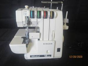 lot 123 image: SINGER ULTRALOCK  MODEL 14U34B SEWING MACHINE