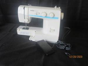 lot 124 image: BROTHER LS-1217 SEWING MACHINE
