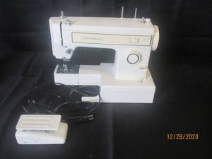 lot 127 image: KENMORE MODEL 1212140 SEWING MACHINE