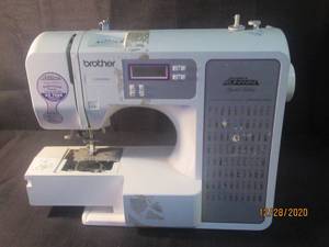 lot 147 image: BROTHER PROJECT RUNWAY LIMITED EDITION COMPUTERIZED SEWING MODEL CE8080PRW NO POWER CORD