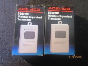 lot 107 image: 2 ADEMCO MINITURE SUPERVISED TRANSMITTER  MODEL 5802MN
