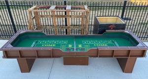 lot 1 image: Full Size Craps Table with roller for table and woodenbox on wheels for base
