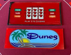 lot 132 image: 2 Slot Machine Glass