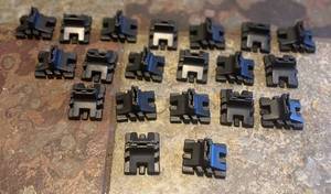 lot 369 image: 20 Divider Foot Pegs for Vending Trays