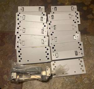 lot 422 image: Metal Brackets these attach to the side of the trays in the Vending machines and a set of Pallet Brackets