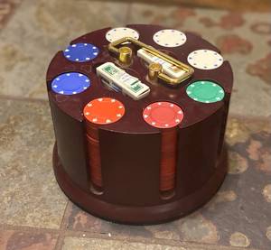 lot 446 image: Poker Chip Carousel 216 chips and 2 decks of cards from Bellagio