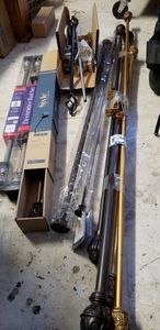 lot 12 image: Curtain Rods various sizes, see pictures