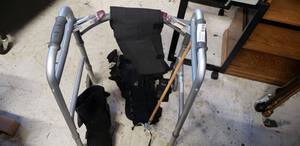 lot 15 image: 2 Button Folding Walker, GrabberReacher Tool, Large Orthopedic Boot, Back Support Belts and Roller Blade Gloves