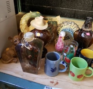 lot 55 image: Ceramic Duck and Turkey Cookie Jars, Lion Cub, HandBlown Glass Decanters, Coffee Mugs