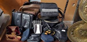 lot 73 image: Advantage Organizer, Car Mobile Phone Holder, Various Camera Bags, some leather, Minolta, Polaroid, Canon, Retina and Pigeon