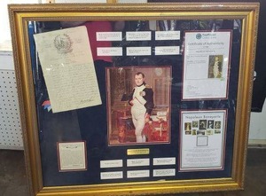 lot 113 image: Napoleon Bonaparte Framed pictures and quotes Including piece of his hair with Certificate of authenticity from Paul Fraser Collectibles