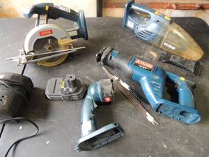lot 176 image: Ryobi Set  18 V  CONSISTS OF Flashlight,  Vacuum Skillsaw 3 blades has charger, Reciprocating Saw, battery,  vacume has 2 suction pieces