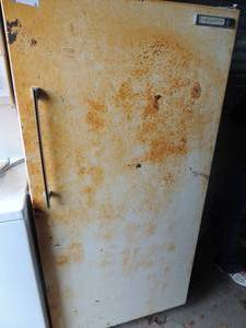lot 262 image: Upright Marquette freezer   door rusted   Inside is clean 59x28x27