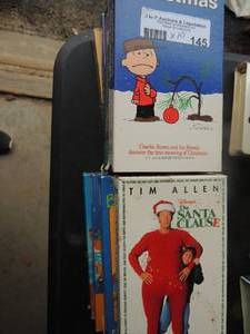 lot 145 image: Kids VHS lot 10 total The Santa clause, best of Elmo, Charlie brown christmas