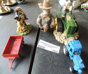 lot 160 image: 3 Cow figurines plus 2 toy wagon tractor