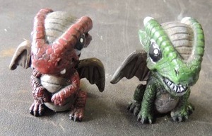 lot 164 image: 2 wooden dragons one red and one green