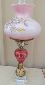 lot 42 image: Victorian lamp ETCHED CRANBERRY GLASS with Hand painted flowers ON GLASS GLOBE  marble base 26x10