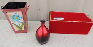lot 46 image: Red velvet jewlery box, metal vase, vase that open to store nail supplies